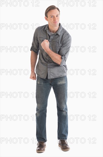 Portrait of young man gesturing.