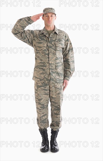 Studio shot of saluting soldier.