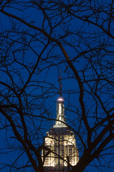 Empire State building illuminated at dusk. New York, New York.