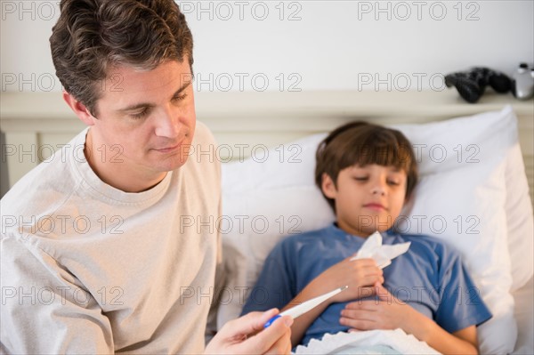 Father taking care of sick son (8-9)