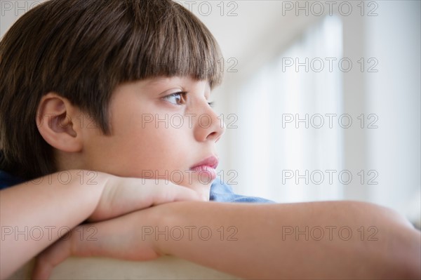 Portrait of pensive boy (8-9)