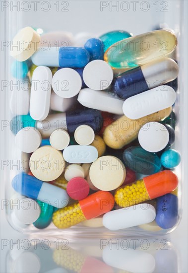 Studio shot of various pills in bottle