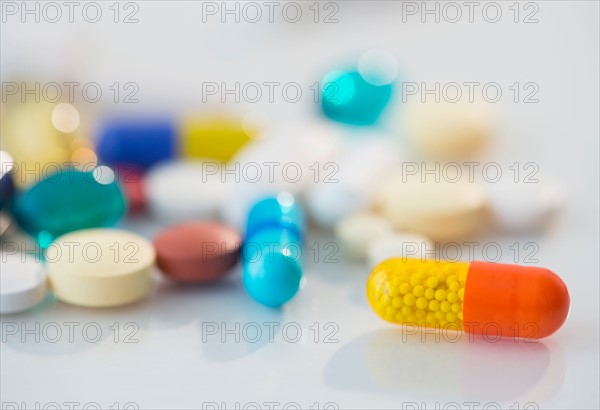 Studio shot of various pills in bottle