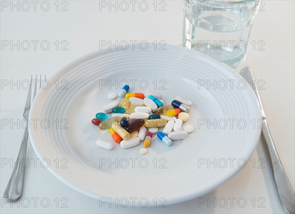 Studio shot of pills on plate