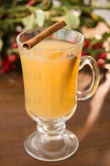 Hot apple cider on table