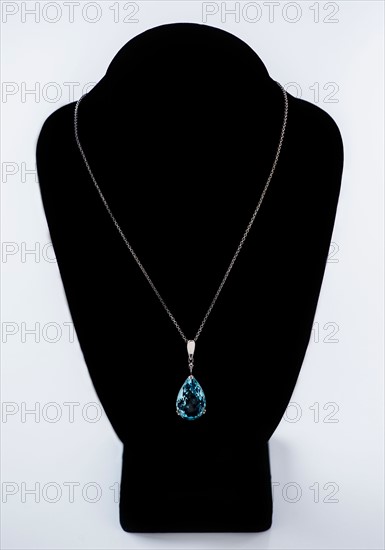 Studio shot of beautiful necklace with blue stone