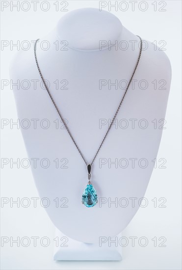 Studio shot of beautiful necklace with blue stone