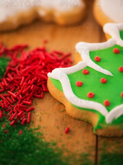 Close-up of christmas tree gingerbread and sprinkles