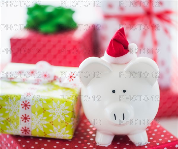 Piggy bank and christmas gifts