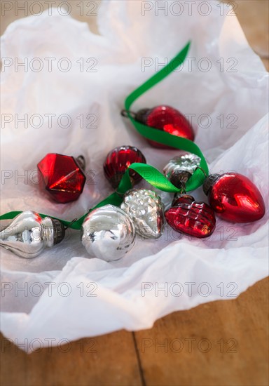 Christmas baubles wrapped in paper