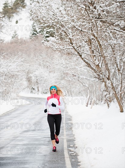 Woman jogging in winter