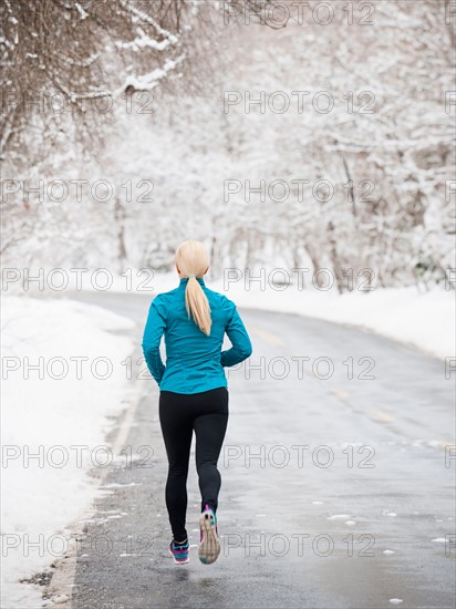 Woman jogging in winter