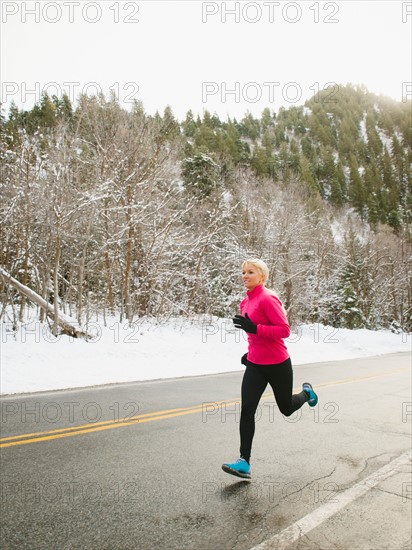 Woman jogging in winter