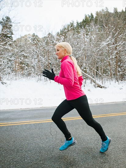 Woman jogging in winter