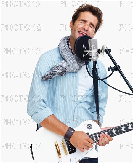 Studio shot of man singing