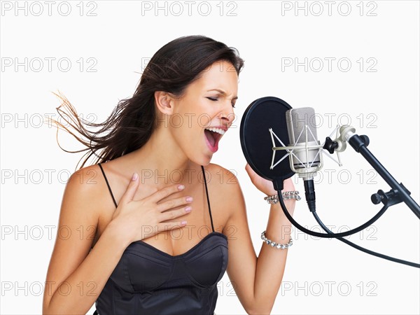 Studio shot of singing rockstar