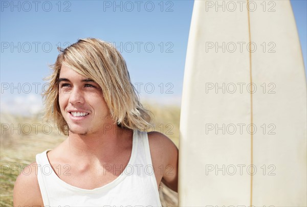 Portrait of male surfer