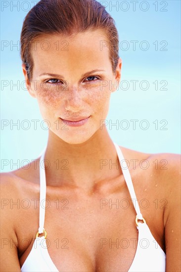 Portrait of young woman in bikini