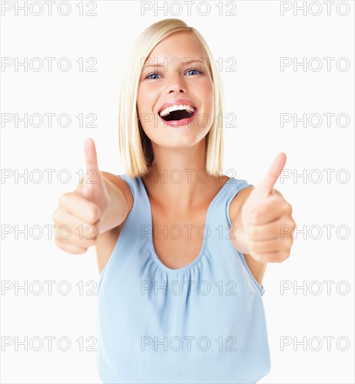 Studio Shot, Portrait of young woman with thumbs up