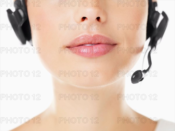 Close-up of woman wearing headset