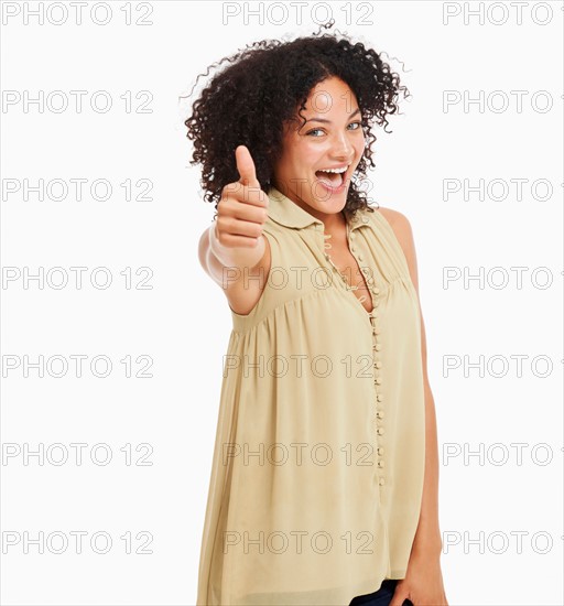 Studio portrait of young woman gesturing