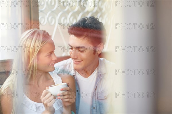 Couple drinking tea in cafe