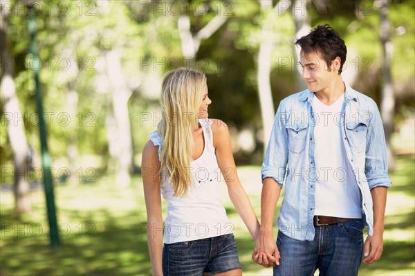 Couple walking in park