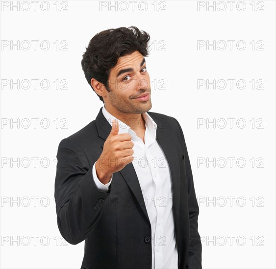 Studio portrait of stylish man gesturing