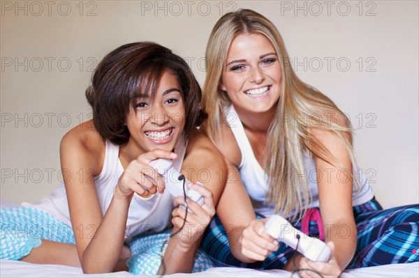 Two women playing video game