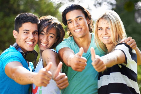 Portrait of group of friends gesturing