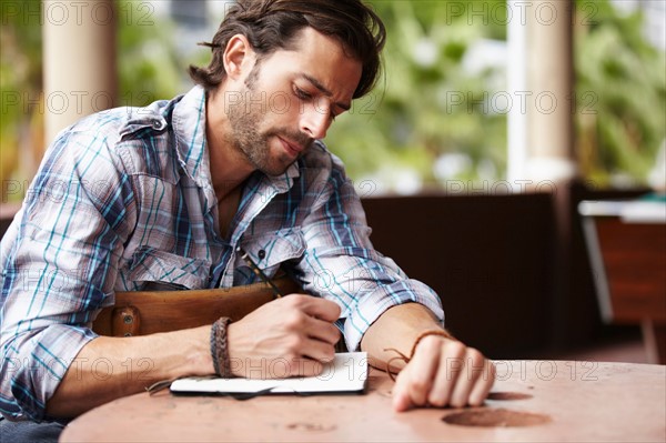 Man doing notes