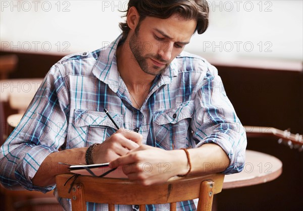 Man doing notes