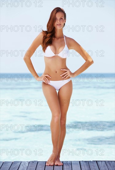 Portrait of young woman in bikini