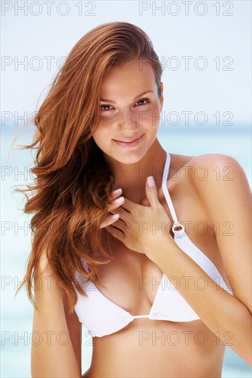 Portrait of young woman in bikini