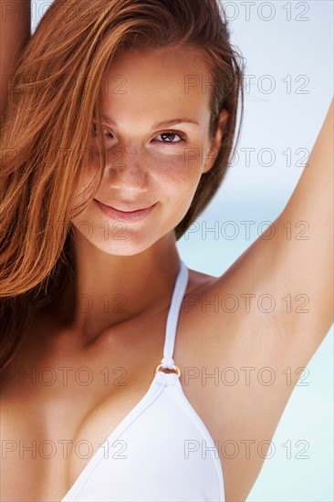 Portrait of young woman in bikini