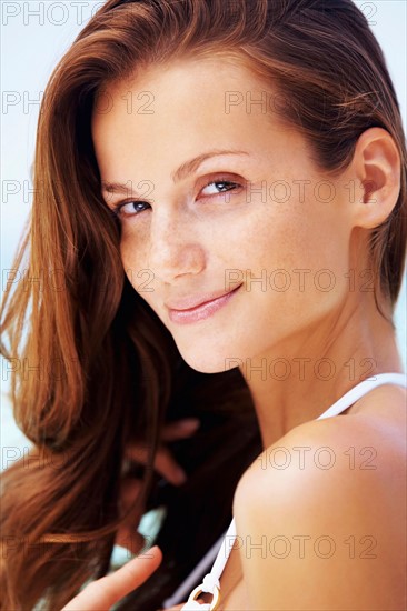 Portrait of young woman in bikini