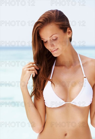 Portrait of young woman in bikini