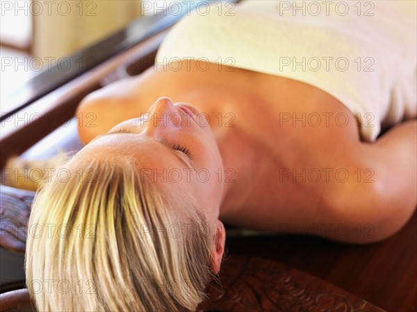 Woman relaxing in spa