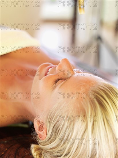 Woman relaxing in spa