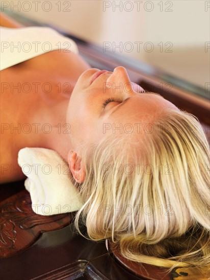 Woman relaxing in spa