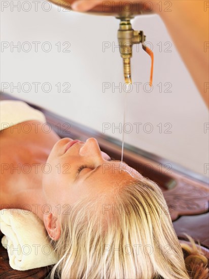 Woman relaxing in spa