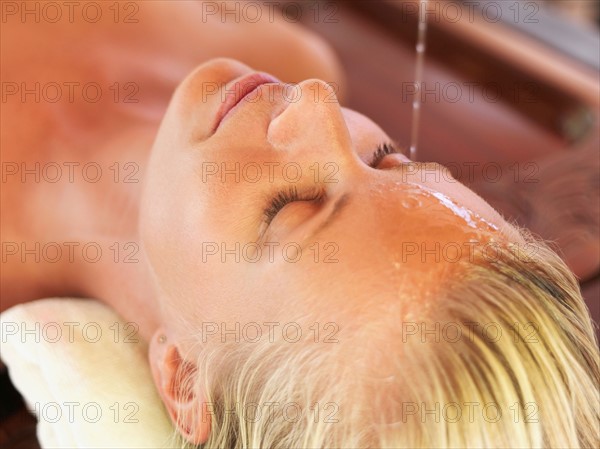 Woman relaxing in spa