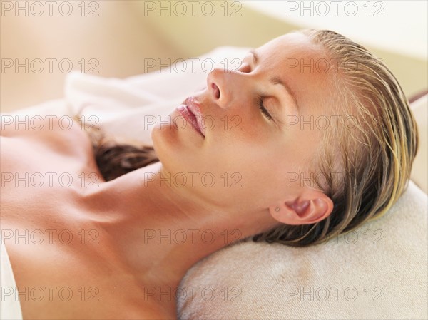 Woman relaxing in spa