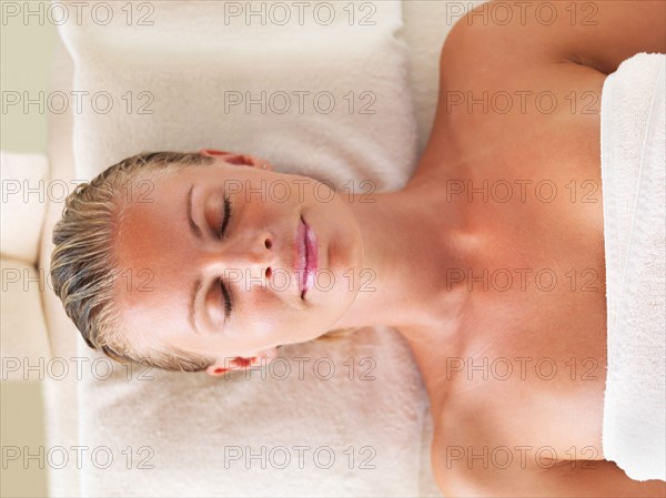 Woman relaxing in spa