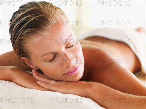 Woman relaxing in spa