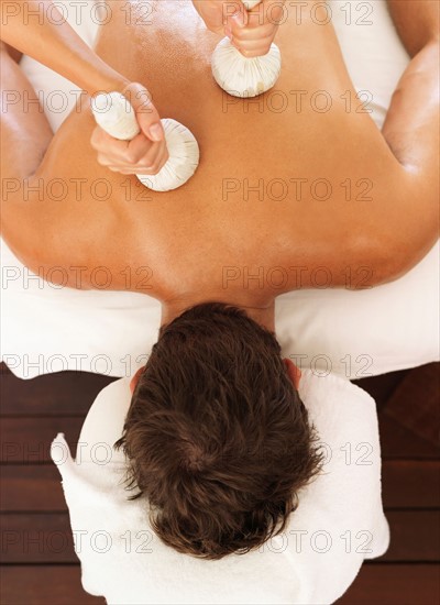 Man getting massage in spa