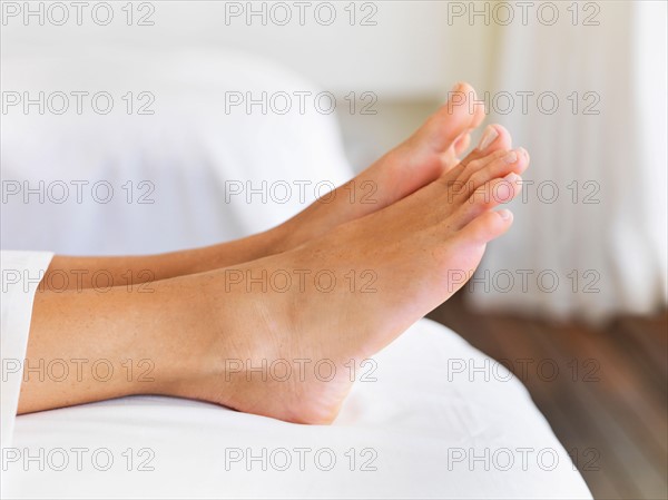 Bare feet of woman in spa