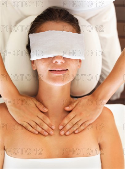 Woman receiving massage in spa