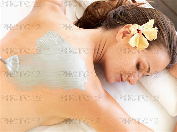 Woman receiving spa treatment