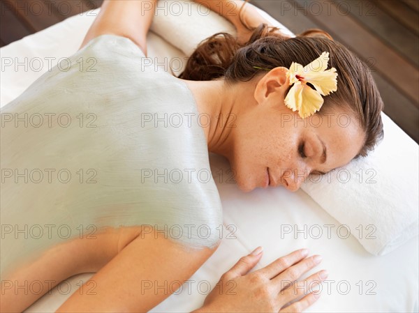 Woman receiving spa treatment